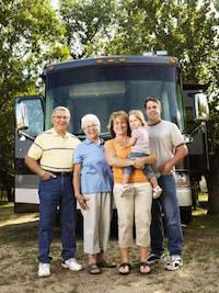 Image of three Generations in front of their Motorhome